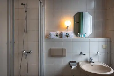 Ein Badezimmer in der Unterkunft Der Bayerische Hof