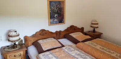 Ein Bett oder Betten in einem Zimmer der Unterkunft Ferienhaus Gemütlichkeit
