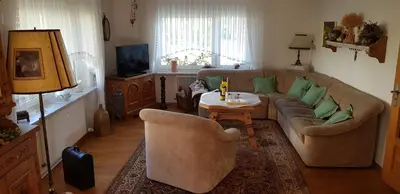 Ein Sitzbereich in der Unterkunft Ferienhaus Gemütlichkeit