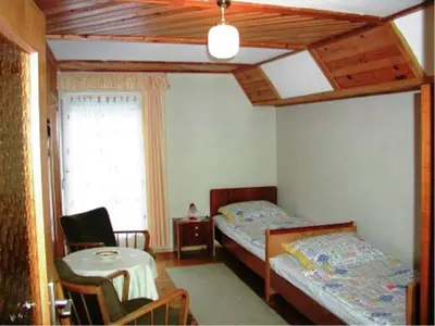 Ein Bett oder Betten in einem Zimmer der Unterkunft Ferienhaus in Tännesberg for 4 Personen