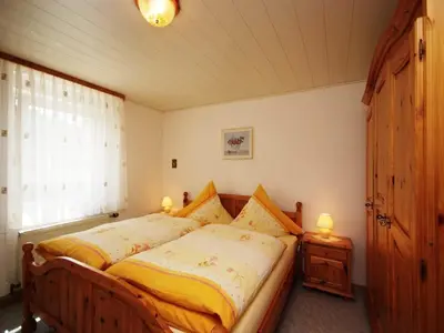 Ein Bett oder Betten in einem Zimmer der Unterkunft Wohnung in Waldnähe in Plankenstein