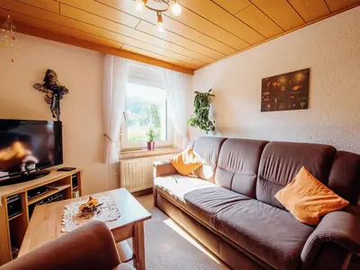 Ein Sitzbereich in der Unterkunft Wohnung in Waldnähe in Plankenstein
