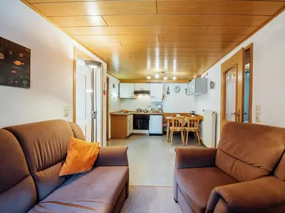 Ein Sitzbereich in der Unterkunft Wohnung in Waldnähe in Plankenstein
