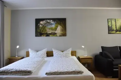 Ein Bett oder Betten in einem Zimmer der Unterkunft Hotel Garni Am Klostermarkt