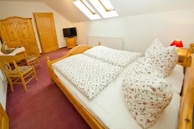 Ein Bett oder Betten in einem Zimmer der Unterkunft Hotel Garni Am Klostermarkt