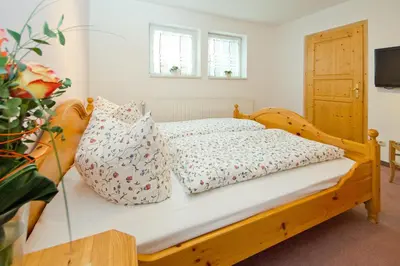 Ein Bett oder Betten in einem Zimmer der Unterkunft Hotel Garni Am Klostermarkt