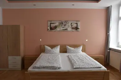 Ein Bett oder Betten in einem Zimmer der Unterkunft Hotel Garni Am Klostermarkt