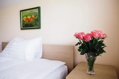 Ein Bett oder Betten in einem Zimmer der Unterkunft Hotel - Pension Vesta