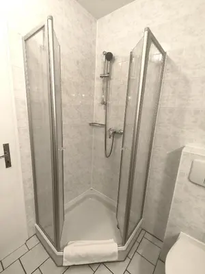 Ein Badezimmer in der Unterkunft Ferienhotel Zwotatal