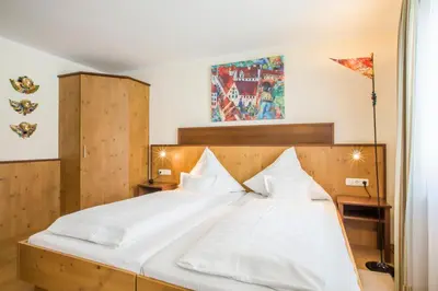 Ein Bett oder Betten in einem Zimmer der Unterkunft Hotel Brunner
