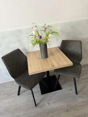Ein Sitzbereich in der Unterkunft Hotel Weile