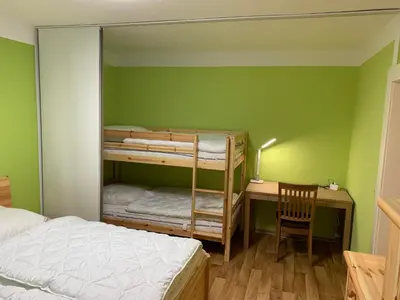 Ein Bett oder Betten in einem Zimmer der Unterkunft FeWo direkt am Loipeneinstieg, Lademöglichkeit E-Auto!