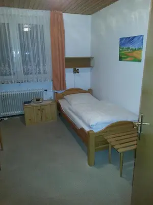 Ein Bett oder Betten in einem Zimmer der Unterkunft Landgasthof Zur Mühle