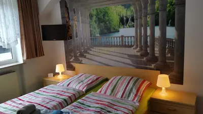 Ein Bett oder Betten in einem Zimmer der Unterkunft Hotel-Pension Dressel
