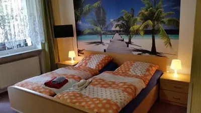 Ein Bett oder Betten in einem Zimmer der Unterkunft Hotel-Pension Dressel