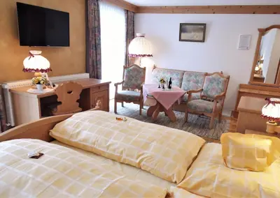 Ein Bett oder Betten in einem Zimmer der Unterkunft Landgasthof/Landhaus Waldlust