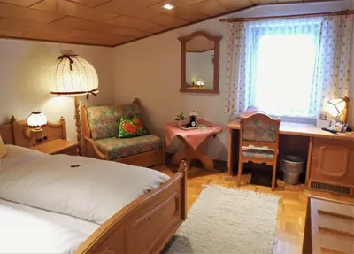 Ein Bett oder Betten in einem Zimmer der Unterkunft Landgasthof/Landhaus Waldlust