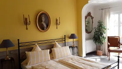 Ein Bett oder Betten in einem Zimmer der Unterkunft Hotel-Restaurant Bergmühle
