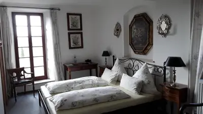 Ein Bett oder Betten in einem Zimmer der Unterkunft Hotel-Restaurant Bergmühle