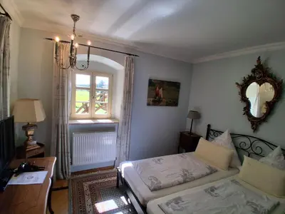 Ein Bett oder Betten in einem Zimmer der Unterkunft Hotel-Restaurant Bergmühle