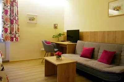 Ein Sitzbereich in der Unterkunft Hotel Grader