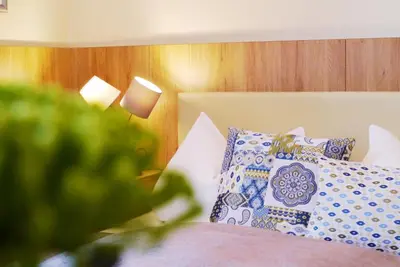 Ein Bett oder Betten in einem Zimmer der Unterkunft Hotel Grader