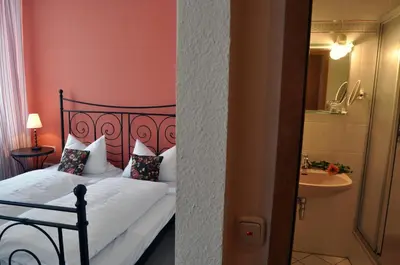Ein Bett oder Betten in einem Zimmer der Unterkunft Hotel Grader