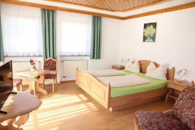 Ein Sitzbereich in der Unterkunft Ute's Pension