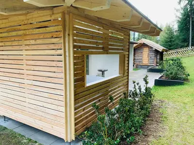 Ein Garten an der Unterkunft Erzgebirgsidyll Breitenbrunn - Waldhaus