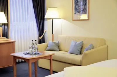 Ein Sitzbereich in der Unterkunft Hotel Gasthof Am Forsthof