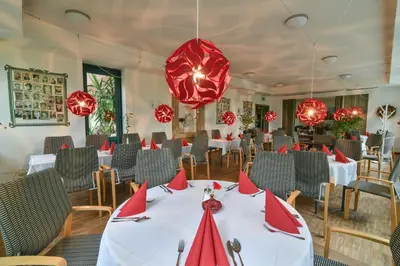Ein Restaurant oder anderes Speiselokal in der Unterkunft Luisenburg Resort