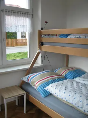 Ein Bett oder Betten in einem Zimmer der Unterkunft Ferienwohnungen Reiterhof Lienemann