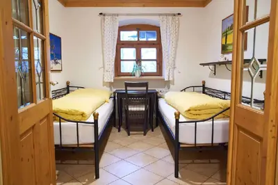 Ein Bett oder Betten in einem Zimmer der Unterkunft Ferienpension Posthof