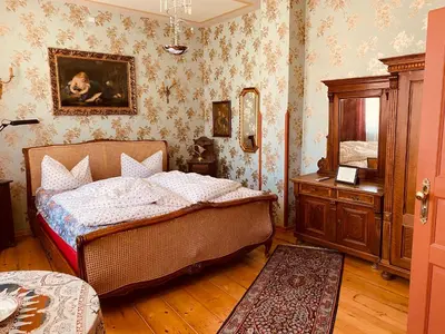 Ein Bett oder Betten in einem Zimmer der Unterkunft Altes Handelshaus Plauen