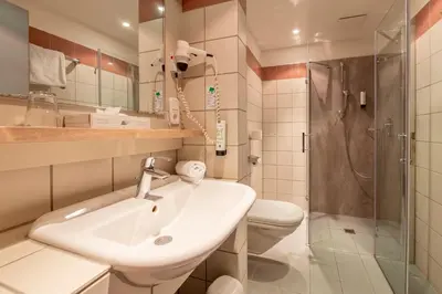 Ein Badezimmer in der Unterkunft Golfhotel Fahrenbach