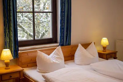 Ein Bett oder Betten in einem Zimmer der Unterkunft Bio Ferienhof Erzengel