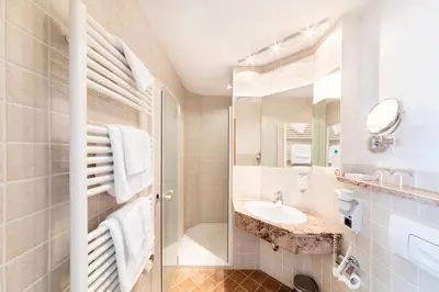 Ein Badezimmer in der Unterkunft Hotel Forstmeister