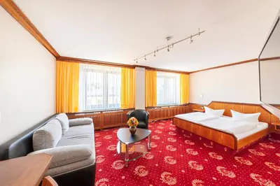 Ein Bett oder Betten in einem Zimmer der Unterkunft Hotel Forstmeister