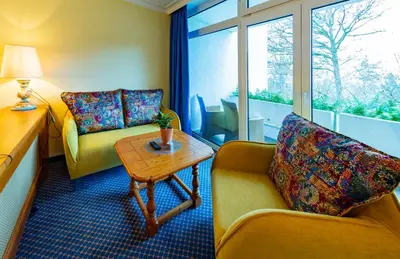 Ein Sitzbereich in der Unterkunft Hotel Reiterhof