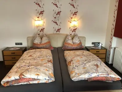 Ein Bett oder Betten in einem Zimmer der Unterkunft Haus Ingrid