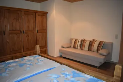 Ein Bett oder Betten in einem Zimmer der Unterkunft Ferienwohnung Sternkopf