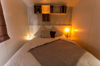 Ein Bett oder Betten in einem Zimmer der Unterkunft Fidelios Appartements