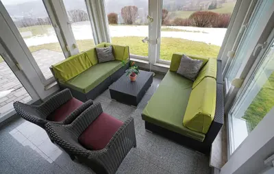 Ein Sitzbereich in der Unterkunft Domizil Aschbergblick