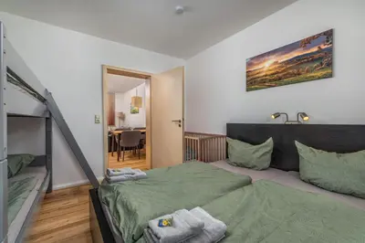 Ein Bett oder Betten in einem Zimmer der Unterkunft EINFACH SCHÖN Ferienwohnungen