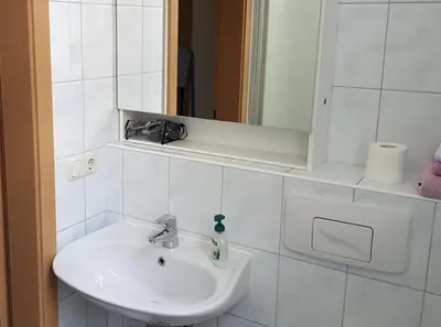 Ein Badezimmer in der Unterkunft Ferienwohnung zum 