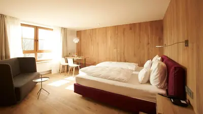 Ein Bett oder Betten in einem Zimmer der Unterkunft Landhotel Weißes Roß
