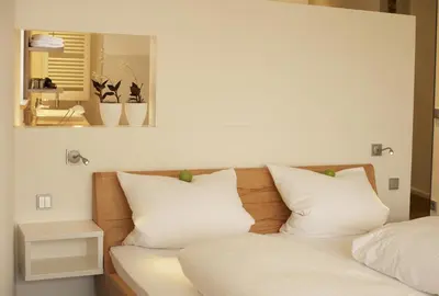 Ein Bett oder Betten in einem Zimmer der Unterkunft Landhotel Weißes Roß