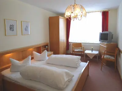 Ein Bett oder Betten in einem Zimmer der Unterkunft Hotel Krone