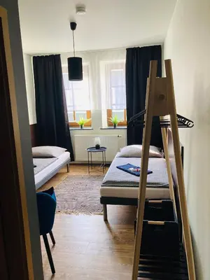 Ein Bett oder Betten in einem Zimmer der Unterkunft Pension Boulevard