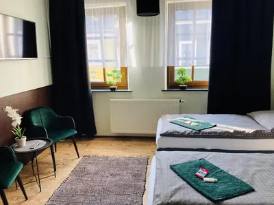 Ein Bett oder Betten in einem Zimmer der Unterkunft Pension Boulevard